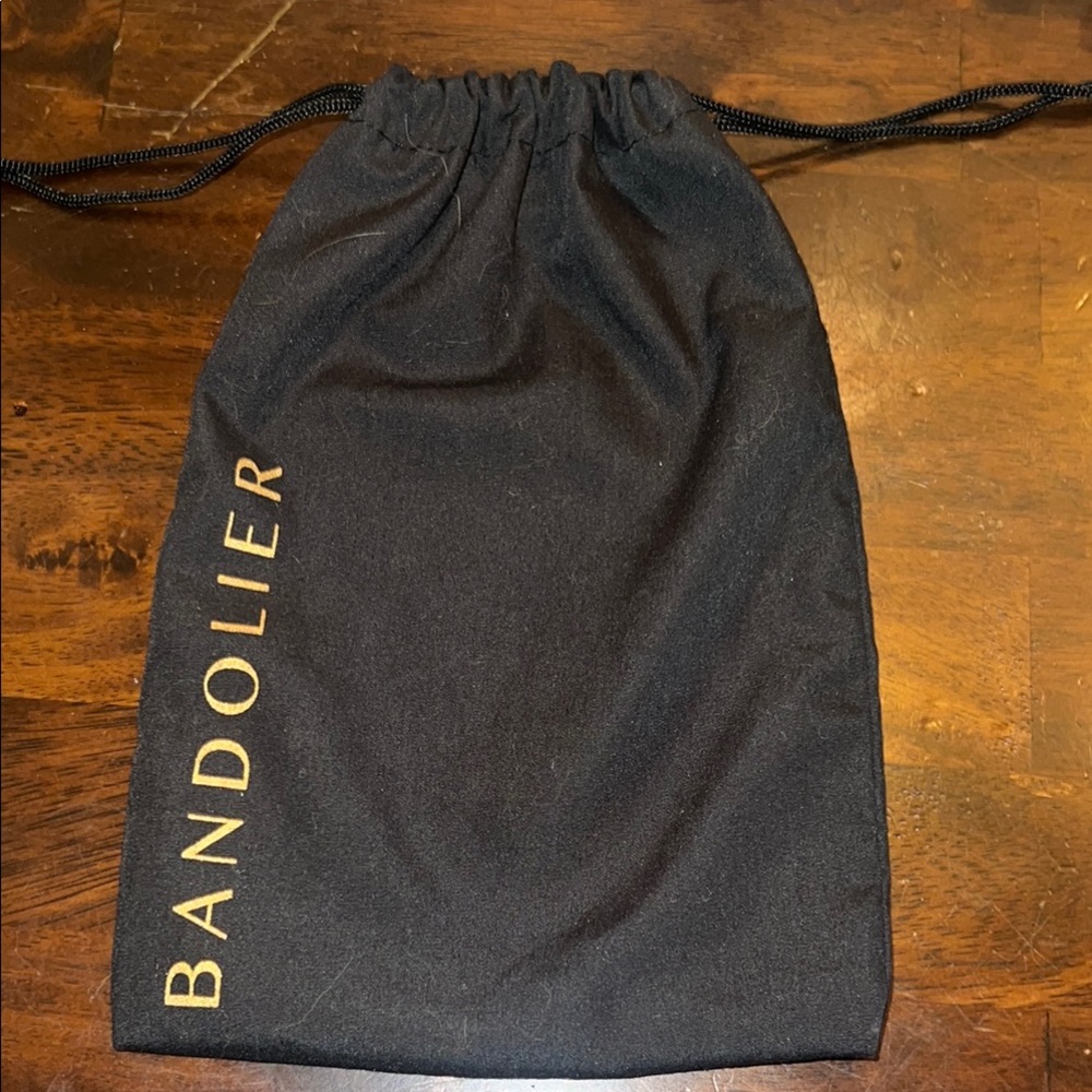 Bandolier Black and Gold Drawstring dust cover